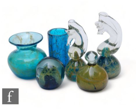 A collection of Mdina glass to include two paperweights formed as seahorses, another of globe form, another domed with upper 