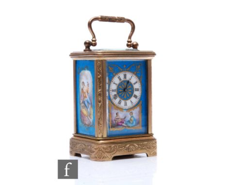 A 19th Century French miniature brass carriage clock with sevres style porcelain panels to the face and sides painted with a 