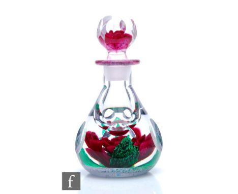 A contemporary Scottish Borders Art Glass perfume bottle designed by Peter Holmes, of tapering ovoid form, the body decorated