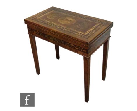 A mid 19th Century Killarney fold over rectangular games table, probably by James Egan (1799-1842), constructed in yew, cherr