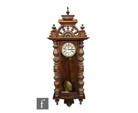 A late 19th Century style Vienna light walnut cased regulator wall clock by Gustave Becker, twin weight driven movement, the 