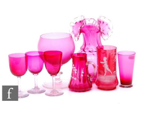 A collection of 19th Century and later ruby glass to include a large frill rim vase, wrythen goblet, a Mary Gregory enamelled