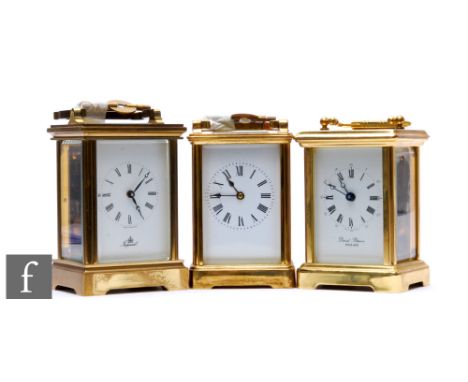 A 20th Century French brass carriage clock by David Peterson England, an Imperial brass carriage clock and one other, two wit