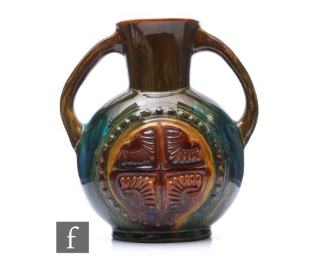 A Linthorpe&nbsp;Pottery vase designed by Dr Christopher Dresser, of ovoid form with flared neck and twin handles, shape 337,