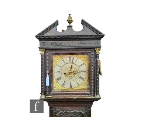 An early 19th Century and later oak cased longcase clock by W. Winn. Hinstock, eight day striking movement, engraved silvered