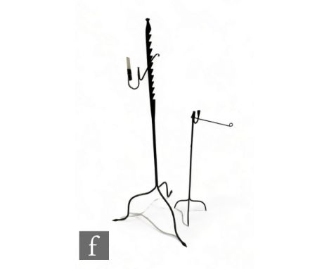 An 18th Century or later floorstanding tripod rush light holder with single sconce on an adjustable ratchet, height 150cm, an
