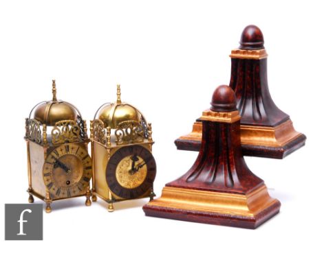 Two small 17th Century style brass lantern clocks, height 27cm, and two parcel gilt Regency style clock brackets. (4) 