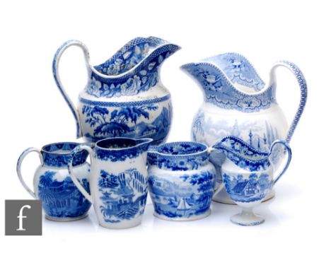 A collection of 19th Century transfer and pearlware blue and white jugs, to include helmet, ovoid and baluster form jugs all 