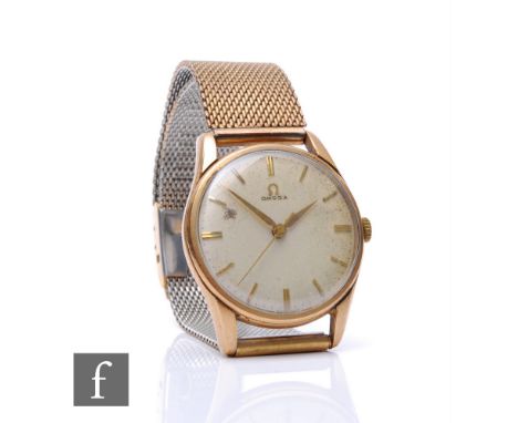 A gentleman's 9ct hallmarked Omega manual wind wrist watch, batons to a circular dial, case diameter 34mm, Birmingham 1961, t
