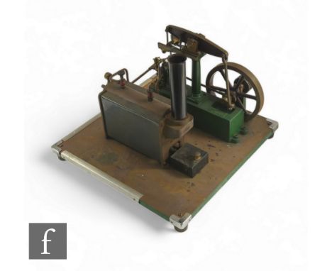 A large Stuart stationary model of a beam engine, painted green, with oscillating flywheel with chimney stack and a spirit bu