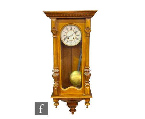 A late 19th Century style Vienna light walnut cased regulator wall clock, single weight driven movement, the circular dial en