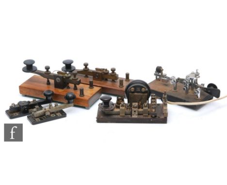 A Vibroplex Morse key No 164718 or mechanical bug, a similar model with speak attachment and four other Morse keys. (6)