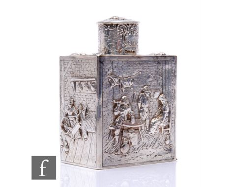 A 19th Century Dutch silver rectangular shaped tea caddy with embossed tavern and other scenes below a pull foliate decorated