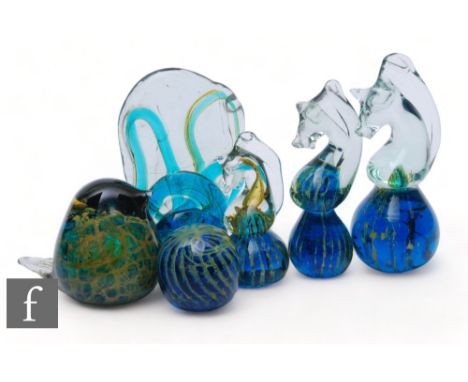 A Mdina free form knot, height 17cm, together with a stylised sculpture of a bird and a globe form paperweight, signed, and t