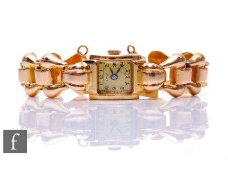 A mid 20th Century 18ct lady's manual wind Lanco wrist watch, Arabic numerals to a gilt dial and integral 18ct bracelet, tota