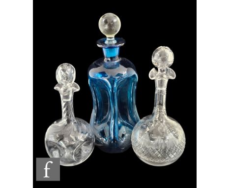 A small late 19th to early 20th Century scrooge decanter, all in a blue ground with a solid clear crystal sphere stopper, tog