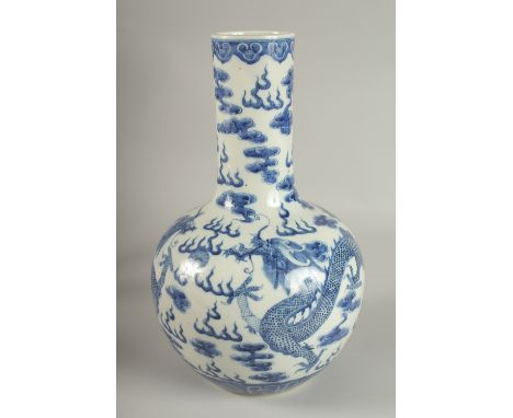 A LARGE CHINESE BLUE AND WHITE PORCELAIN DRAGON VASE, the base with character mark, 36cm high.