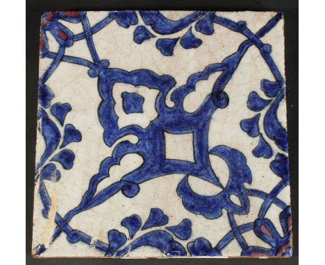 AN 18TH CENTURY OTTOMAN GLAZED POTTERY TILE, 20cm square.