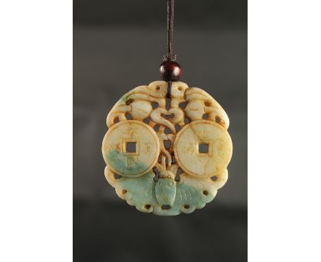 A FINELY CARVED 19TH-EARLY 20TH CENTURY CHINESE CARVED JADE PENDANT, with bats and two inscribed coins, 6cm wide.