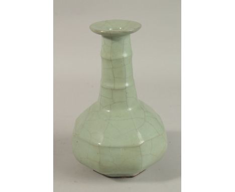 A CHINESE CRACKLE GLAZE CELADON BOTTLE VASE, 23.5cm high.