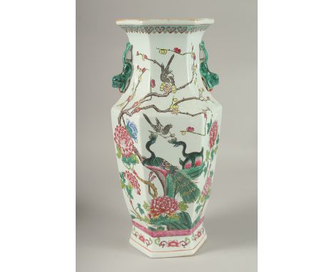 A CHINESE FAMILLE ROSE PORCELAIN HEXAGONAL TWIN HANDLE VASE, 38.5cm high.