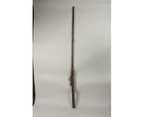 AN 18TH CENTURY MUGHAL INDIAN MATCHLOCK RIFLE, with gold inlaid barrel and trigger.