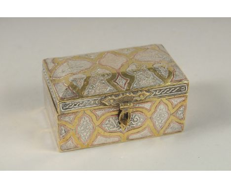 A FINE 19TH CENTURY DAMASCUS SILVER AND COPPER INLAID BRASS BOX, 10cm across.