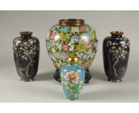 A GOOD COLLECTION OF CLOISONNE ENAMELLED VASES, including a fine pair of vases (one af), and a floral jar with hardwood stand