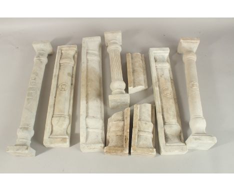 A COLLECTION OF SEVEN ISLAMIC MAMLUK STYLE CARVED MARBLE PILLARS, some with Mamluk cup symbols, (7).