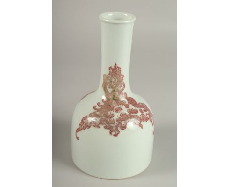 A CHINESE UNDERGLAZE RED AND WHITE PORCELAIN BOTTLE VASE, the base with character mark, 19.5cm high.