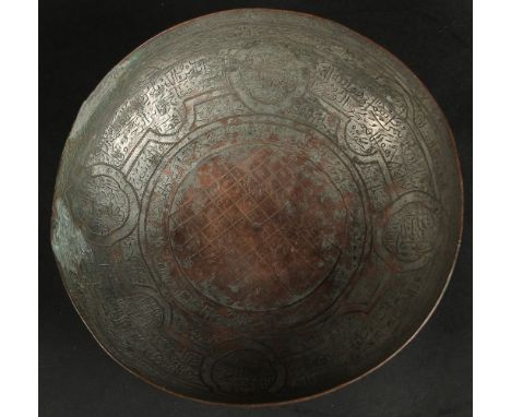 A FINE18TH-19TH CENTURY PERSIAN QAJAR TINNED COPPER CALLIGRAPHIC MAGIC BOWL, 18.5cm wide.