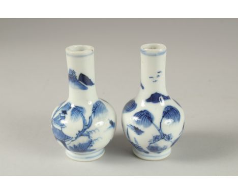 A MINIATURE PAIR OF CHINESE BLUE AND WHITE PORCELAIN VASES, 8.5cm high.