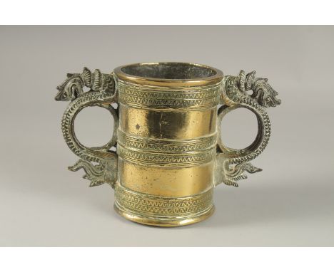 AN UNUSAL GILT BRONZE TWIN HANDLE VESSEL, with strainer at the base, 15.5cm high.