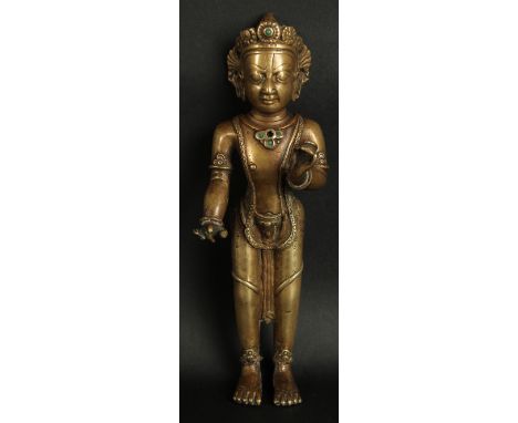 A VERY FINE LARGE 17TH-18TH CENTURY TIBETAN BRONZE FIGURE OF A MALE DEITY, inlaid with turquoise stones, 20cm high.