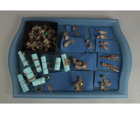 A QUANTITY OF VARIOUS PIECES OF EASTERN JEWELLERY: white metal or possibly low grade silver, including earrings, rings, and v