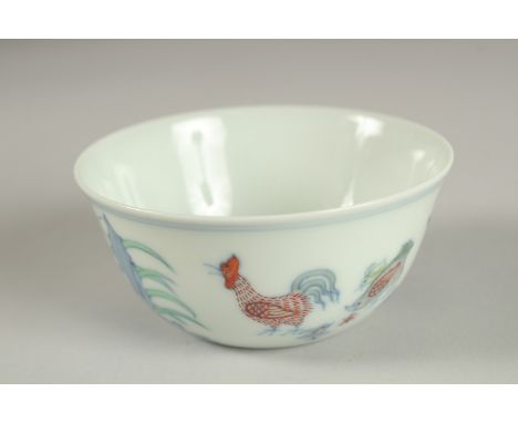 A FINE CHINESE DOUCAI PORCELAIN CHICKEN CUP, the base with character mark, 8.5cm diameter.