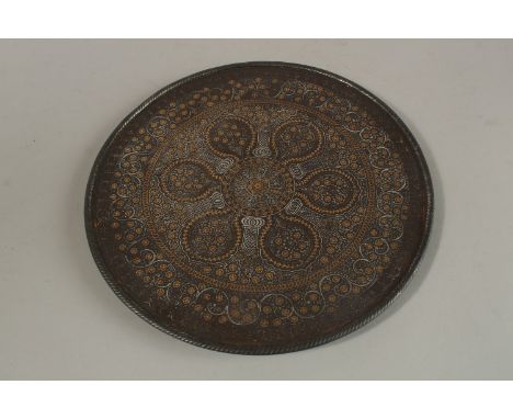 A VERY FINE 19TH CENTURY INDIAN SILVER AND GOLD INLAID KOFTGARI STEEL DISH, 25.5cm diameter.