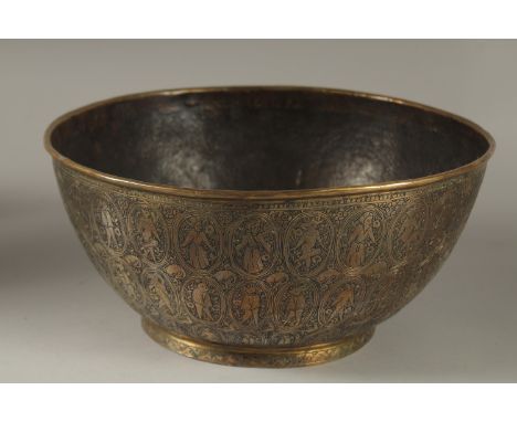 A FINELY ENGRAVED 19TH CENTURY PERSIAN QAJAR BRASS BOWL, 25cm diameter.