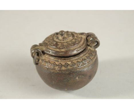 A 17TH-18TH CENTURY BRONZE MONEY BOX, 6cm high.