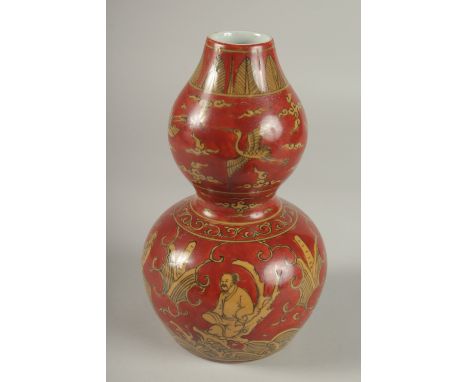 A CHINESE RED GROUND PORCELAIN DOUBLE GOURD VASE, 23cm high.