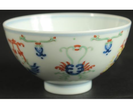 A CHINESE DOUCAI PORCELAIN CUP, with six-character mark, 10cm diameter.