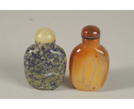 A CHINESE LAPIS SNUFF BOTTLE AND STOPPER, together with an agate snuff bottle and stopper, (2).