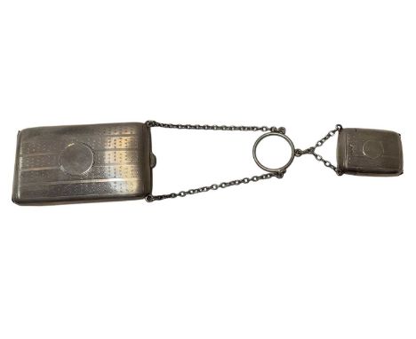 Ladies Silver Vesta and cigarette case joined by chains with engine turned decoration (Birmingham 1918)