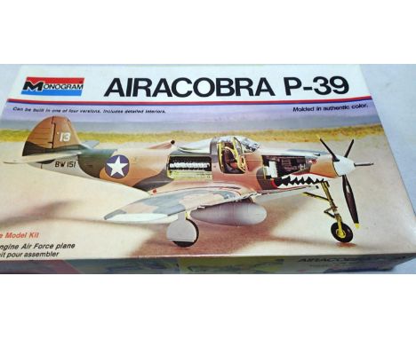 Monogram 1/48 scale Airacobra P-39 kit, appears complete/unchecked and box has wear. P&amp;P Group 1 (£14+VAT for the first l