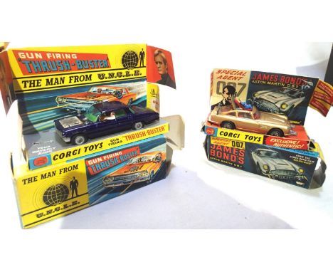 Corgi 497 man from uncle car, blue in good condition, damaged bonnet decal, minor chips, working action, missing ring, box is