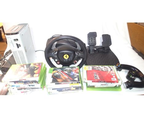 Xbox 360 with remote/power pack and cable plus Thrustmaster Racing wheel and pedals also includes eighteen assorted games, wo