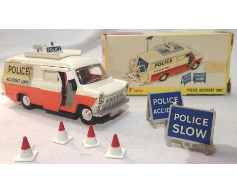 Dinky Toys 287 police transit van in excellent condition, apart from one peeling decal and missing ariel with two signs and f