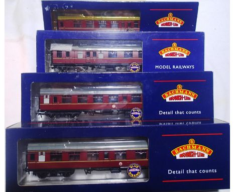 Four OO scale Bachmann BR MK1 Maroon coaches to include 39051-open, 39126 composite, 39226A brake corrider composite, 39076 E