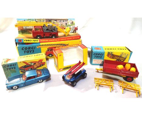 Four Corgi toys to include 64 Conveyor in good condition with figure, box is poor, 62 Trailer in good condition , damaged rav