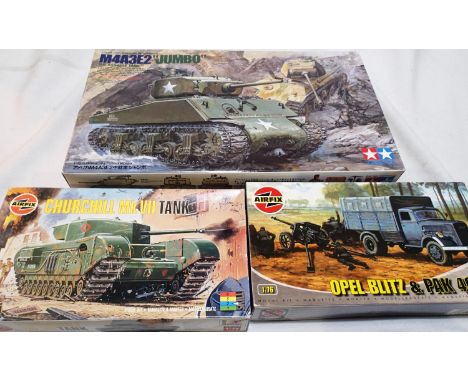 Three military related kits to include Tamiya 1/35 scale M4A3E2 Jumbo, Airfix 1/72 scale Churchill tank and Airfix 1/76 scale